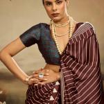 Eloquence Brown Ajrakh Printed Semi Modal Silk Saree With Mesmerising Blouse Piece