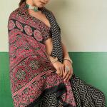 Transcendent Black Ajrakh Printed Semi Modal Silk Saree With Evocative Blouse Piece