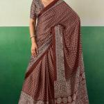 Ornate Brown Ajrakh Printed Semi Modal Silk Saree With Imaginative Blouse Piece