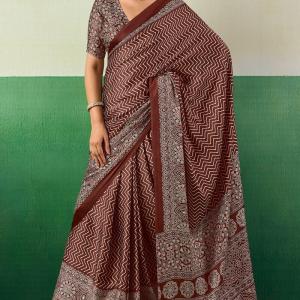 Ornate Brown Ajrakh Printed Semi Modal Silk Saree With Imaginative Blouse Piece