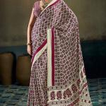 Trendy Beige Ajrakh Printed Satin Silk Saree With Gleaming Blouse Piece