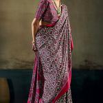 Opulent Wine Ajrakh Printed Satin Silk Saree With Twirling Blouse Piece