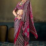 Opulent Wine Ajrakh Printed Satin Silk Saree With Twirling Blouse Piece