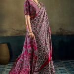 Opulent Wine Ajrakh Printed Satin Silk Saree With Twirling Blouse Piece