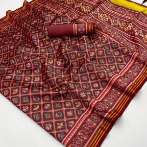 Jazzy Wine Printed Patola Handloom Silk Saree With Pulsating Blouse Piece