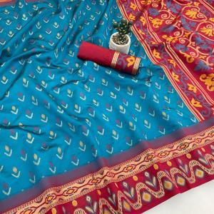 Symmetrical Firozi Banarasi Ikkat Silk Saree With Cynosure Blouse Piece
