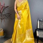 Unique Golden Banarasi Tissue Silk Saree With Diaphanous Blouse Piece