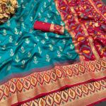 Quintessential Rama Banarasi Ikkat Silk Saree With Snazzy Blouse Piece