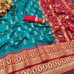 Quintessential Rama Banarasi Ikkat Silk Saree With Snazzy Blouse Piece
