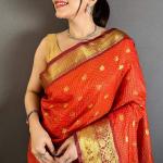Nebula Dark Orange Banarasi Tissue Silk Saree With Splendorous Blouse Piece