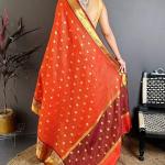 Nebula Dark Orange Banarasi Tissue Silk Saree With Splendorous Blouse Piece