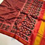 Ornate Maroon Patola Lagdi Patta Saree With Arresting Blouse Piece