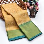 Mesmerising Golden Soft Tissue Silk Saree With Enigmatic Blouse Piece