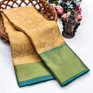 Mesmerising Golden Soft Tissue Silk Saree With Enigmatic Blouse Piece