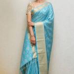 Sophisticated Firozi Kanjivaram Tissue Silk Saree With Scintillating Blouse Piece