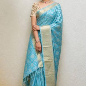 Sophisticated Firozi Kanjivaram Tissue Silk Saree With Scintillating Blouse Piece