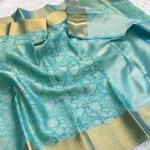 Sophisticated Firozi Kanjivaram Tissue Silk Saree With Scintillating Blouse Piece