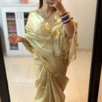 Fancifull Golden Soft Tissue Silk Saree With Demesne Blouse Piece