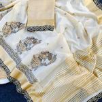 Snazzy Off White Kalamkari Thread Work Tussar Silk Saree With Opulent Blouse Piece