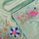 Gossamer Pista Embroidery Work Tissue Silk Saree With Lustrous Blouse Piece