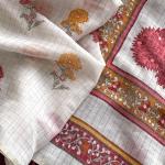Symmetrical Off White Printed Linen Silk Saree With Luxuriant Blouse Piece