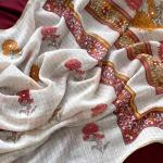 Symmetrical Off White Printed Linen Silk Saree With Luxuriant Blouse Piece
