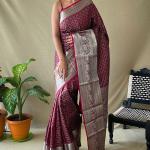 Effervescent Wine Soft Banarasi Silk Saree With Cynosure Blouse Piece