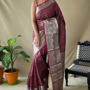 Effervescent Wine Soft Banarasi Silk Saree With Cynosure Blouse Piece