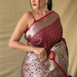 Effervescent Wine Soft Banarasi Silk Saree With Cynosure Blouse Piece